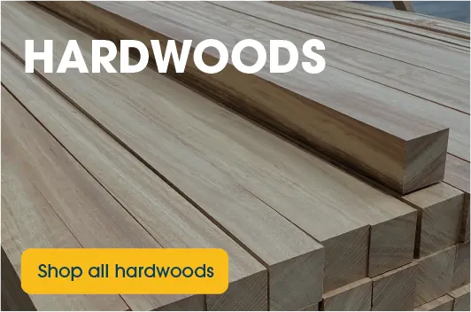 Shop all hardwoods Some pieces of planed hardwood timber, with a yeloow button saying Shop all hardwoods